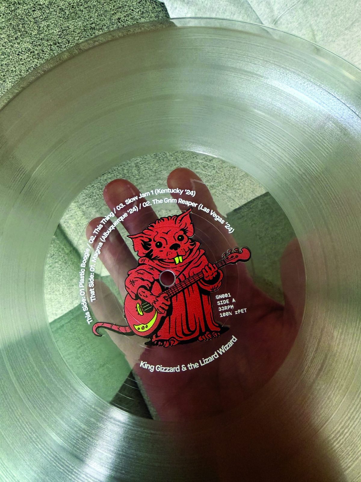 Clear record with a character printed in the center