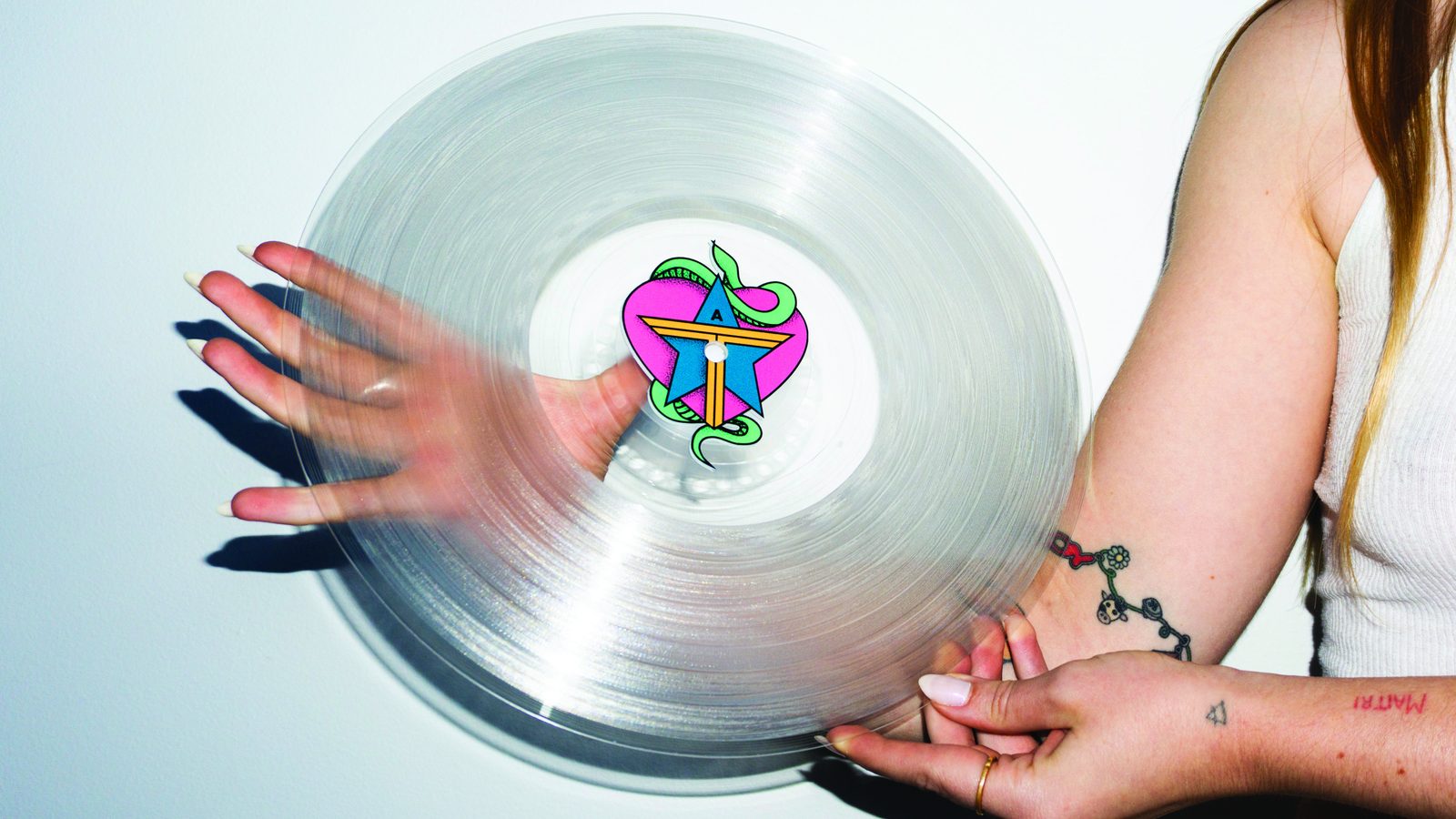 Clear record with a colorful graphic printed in the center